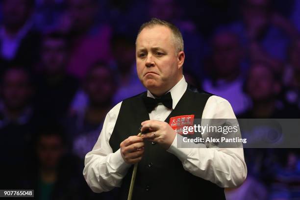 John Higgins looks dejected during the Semi-Final match between Mark Allen and John Higgins on Day Seven of The Dafabet Masters at Alexandra Palace...