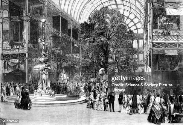 Plate taken from the Illustrated London News . Inside Crystal Palace in Hyde Park, visitors admire the 'Great Exhibition of the Works of the Industry...