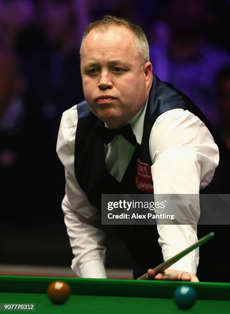 John Higgins looks dejected during the Semi-Final match between Mark Allen and John Higgins on Day Seven of The Dafabet Masters at Alexandra Palace...