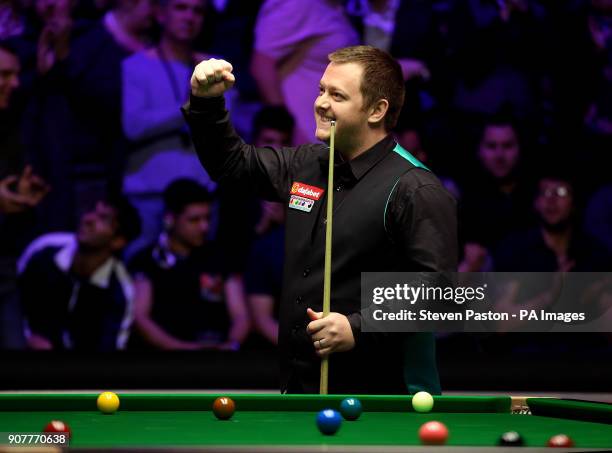 Mark Allen celebrates beating John Higgins during day seven of the 2018 Dafabet Masters at Alexandra Palace, London.