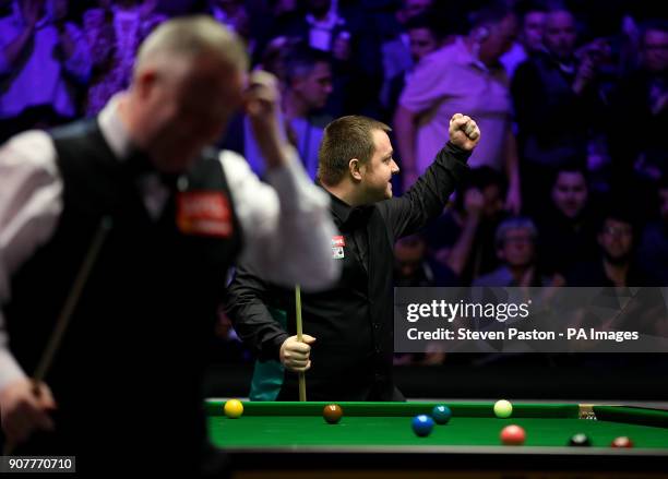 Mark Allen celebrates beating John Higgins during day seven of the 2018 Dafabet Masters at Alexandra Palace, London.