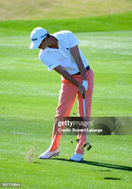 Smylie Kaufman reacts to his shot on the first hole during the third round of the CareerBuilder Challenge at the TPC Stadium Course at PGA West on...