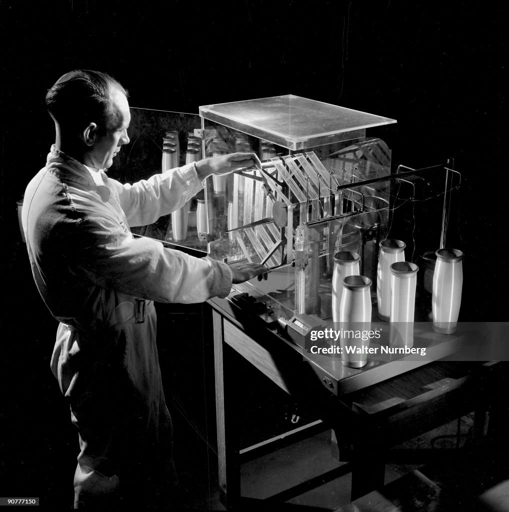 Process worker tests Terylene threads, ICI BIllingham, 1955.