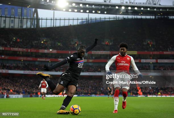 Bakary Sako of Crystal Palace in action with Ainsley Maitland-Niles of Arsenal during the Premier League match between Arsenal and Crystal Palace at...