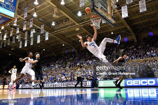 Kene Chukwuka of the Pittsburgh Panthers fouls Grayson Allen of the Duke Blue Devils during their game at Cameron Indoor Stadium on January 20, 2018...