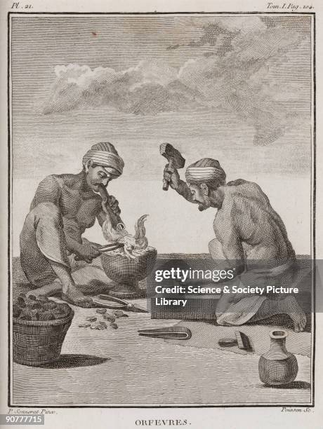 Engraving by Poisson after a painting by Pierre Sonnerat , showing smiths forging gold or silver. The man on the left is blowing through a tube to...