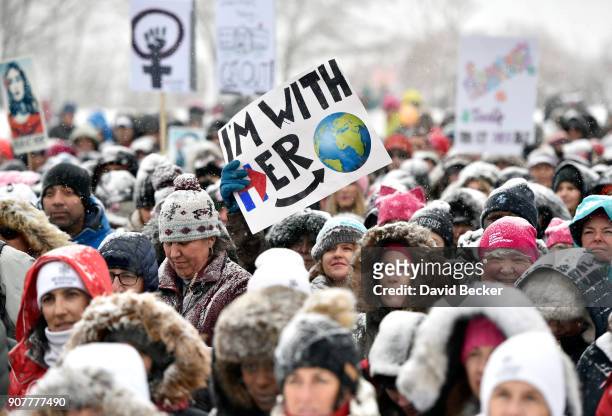 Rally attendees display pins and placards at the Respect Rally during the 2018 Sundance Film Festival on January 20, 2018 in Park City, Utah.