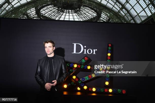 Robert Pattinson poses at Dior Homme Menswear Fall/Winter 2018-2019 show as part of Paris Fashion Week at Grand Palais on January 20, 2018 in Paris,...