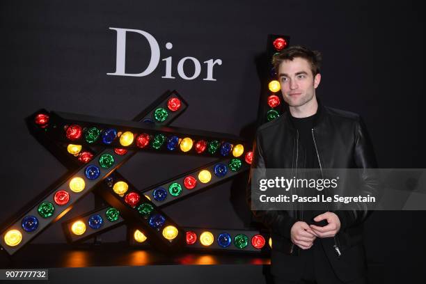 Robert Pattinson poses at Dior Homme Menswear Fall/Winter 2018-2019 show as part of Paris Fashion Week at Grand Palais on January 20, 2018 in Paris,...