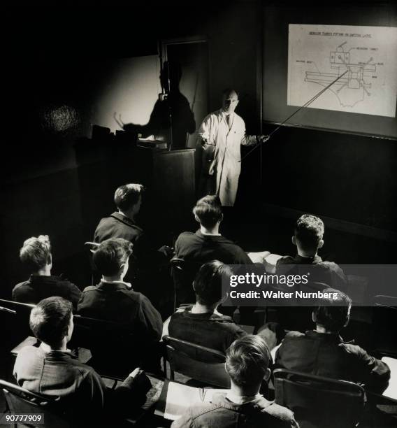 Lecture on a hexagonal turret fitting on capstan lathe. Photograph by Walter Nurnberg who transformed industrial photography after WWII using film...