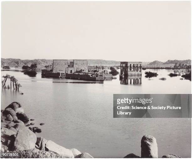 Flooded landscape with Ancient Egyptian temples, from a series of photographs showing the building of the Aswan Dam. In the late 19th century, the...