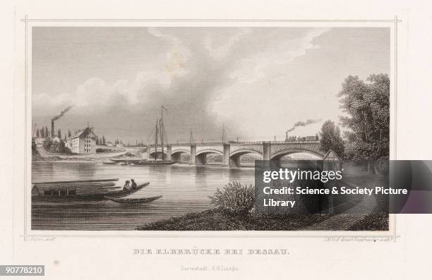 Engraving by Knopfmacher after an original drawing by J Pozzi, titled �Die Elbebrucke bei Dessau�, showing a train passing over the railway bridge...