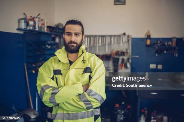handsome auto mechanic - jacket stock pictures, royalty-free photos & images