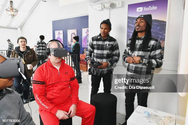 Guests try out the VR station at the Respect Rally Park City Post Reception at the YouTube House on January 20, 2018 in Park City, Utah.