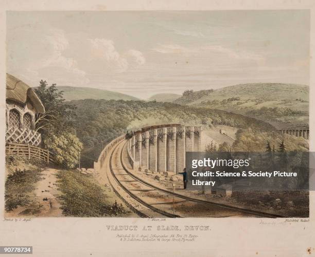 Hand-coloured lithograph of a steam locomotive on the Blatchford Viaduct, South Devon Railway. The 101-foot high trestle viaduct with stone piers was...