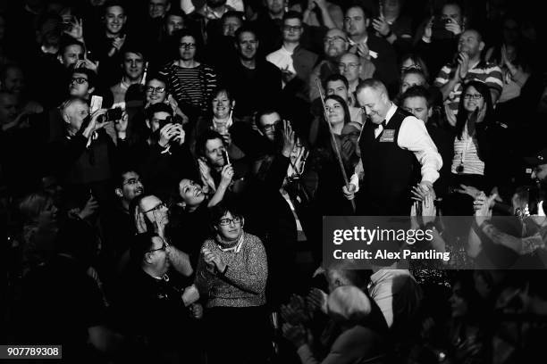 John Higgins makes his entrance during the Semi-Final match between Mark Allen and John Higgins on Day Seven of The Dafabet Masters at Alexandra...