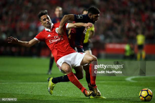 Benfica's forward Jonas vies with Chaves's defender Djavan during the Portuguese League football match between SL Benfica and GD Chaves at Luz...