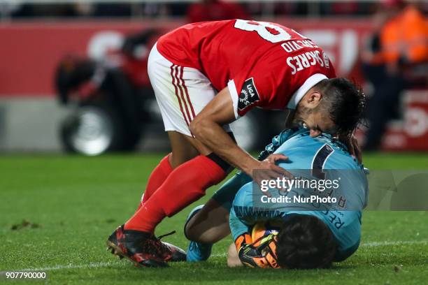 Benfica's forward Eduardo Salvio vies with Chaves's goalkeeper Antonio Filipe during the Portuguese League football match between SL Benfica and GD...