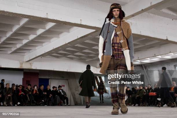 Model walks the runway during the Sacai Menswear Fall/Winter 2018-2019 show as part of Paris Fashion Week on January 20, 2018 in Paris, France.