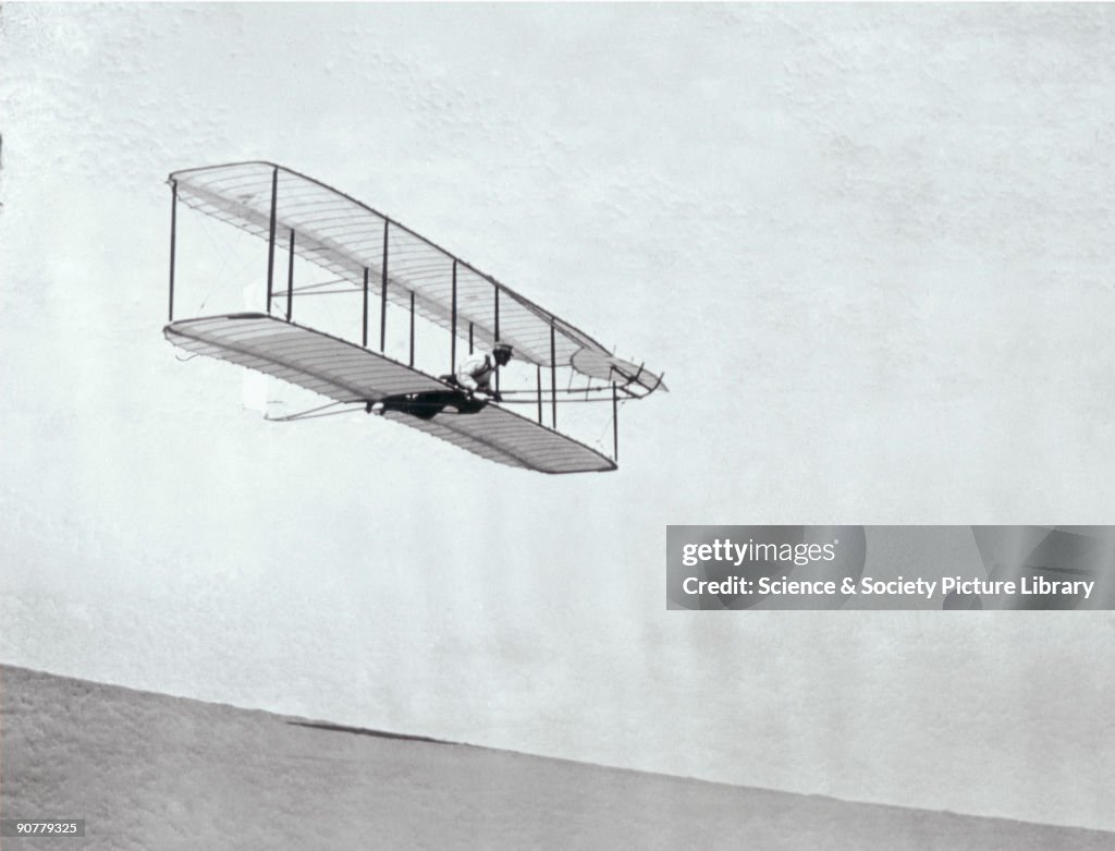 The Wright Brothers modified third glider in flight, 1902.
