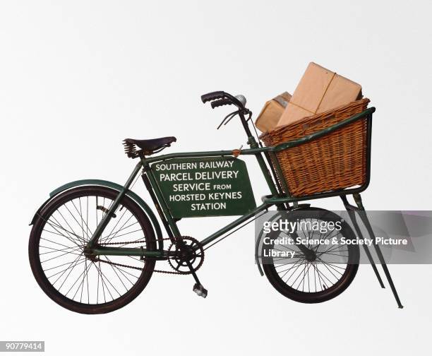 Southern Railway parcel delivery service bicycle from Horsted Keynes station, West Sussex, with parcels piled in the front basket. Bicycles were used...