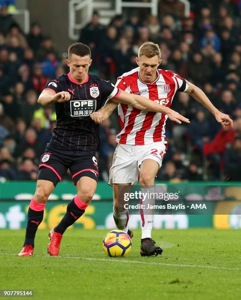 Jonathan Hogg of Huddersfield Town and Darren Fletcher of Stoke City during the Premier League match between Stoke City and Huddersfield Town at...