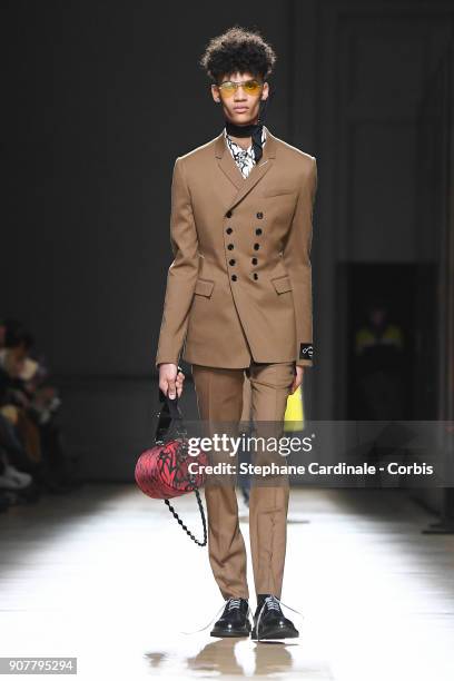 Model walks the runway during the Dior Homme Menswear Fall/Winter 2018-2019 show as part of Paris Fashion Week January 20, 2018 in Paris, France.