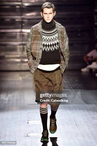 Model walks the runway at the White Mountaineering Autumn Winter 2018 fashion show during Paris Menswear Fashion Week on January 20, 2018 in Paris,...