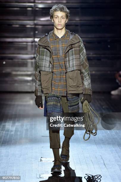 Model walks the runway at the White Mountaineering Autumn Winter 2018 fashion show during Paris Menswear Fashion Week on January 20, 2018 in Paris,...