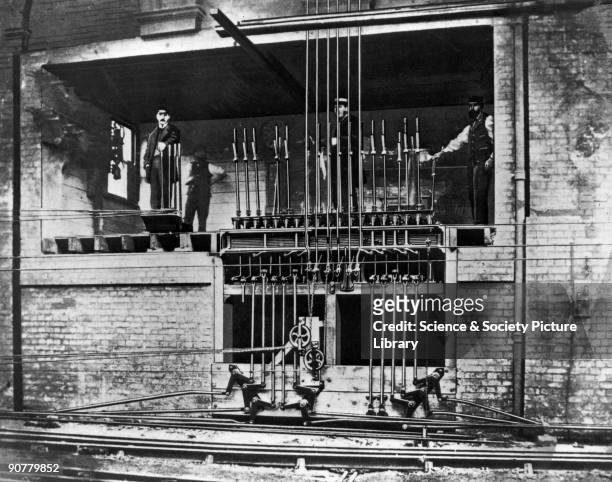 The 'Hole in the Wall' signalbox on the London, Brighton & South Coast Railway's line into London's Victoria station, c 1861. This signalbox was...