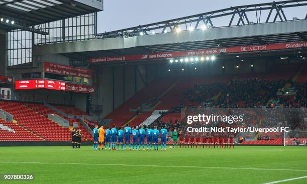 The match officials, Arsenal players and Liverpool players during a minute's applause for Cyrille Regis before the Liverpool v Arsenal FA Youth Cup...