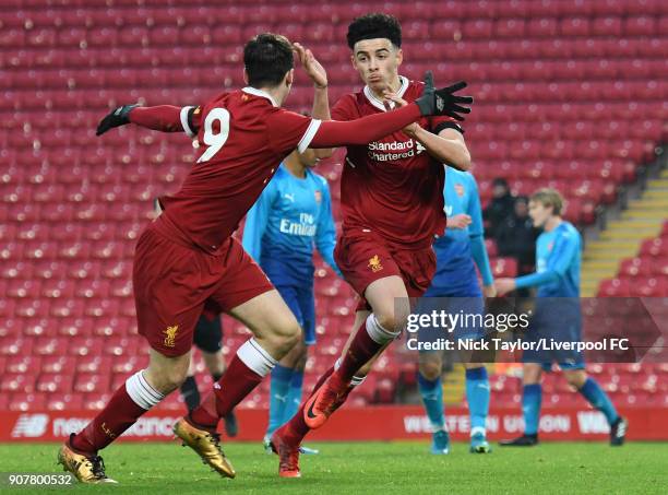 Curtis Jones of Liverpool celebrates his first goal with team mate Liam Millar during the Liverpool v Arsenal FA Youth Cup game at Anfield on January...