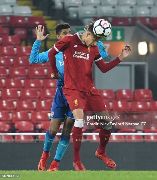 Rhys Williams of Liverpool and Tyreece John-Jules of Arsenal in action during the Liverpool v Arsenal FA Youth Cup game at Anfield on January 20,...