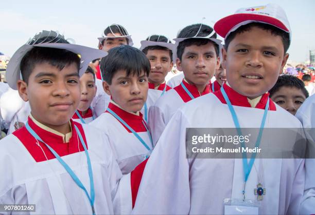 Altar boys smile during Pope Francis 4-day apostolic visit to Peru on January 20, 2018 in Huanchaco, Peru.