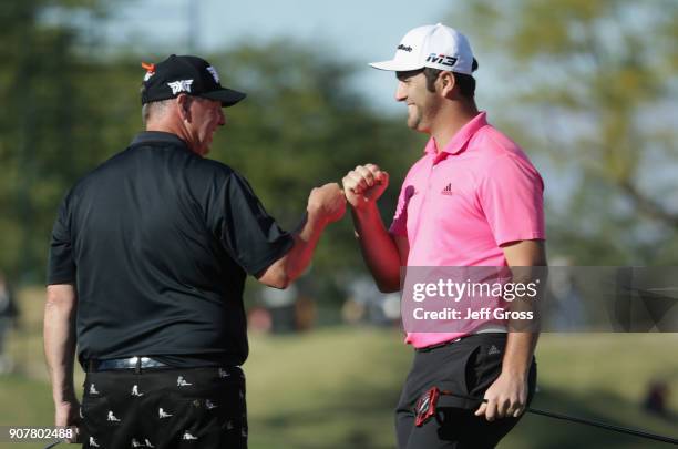 Jon Rahm reacts to his birdie putt on the 16th hole during the third round of the CareerBuilder Challenge at the TPC Stadium Course at PGA West on...