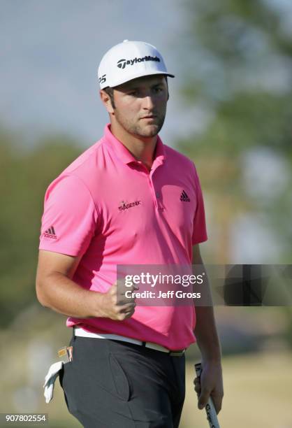 Jon Rahm reacts to his birdie putt on the 16th hole during the third round of the CareerBuilder Challenge at the TPC Stadium Course at PGA West on...