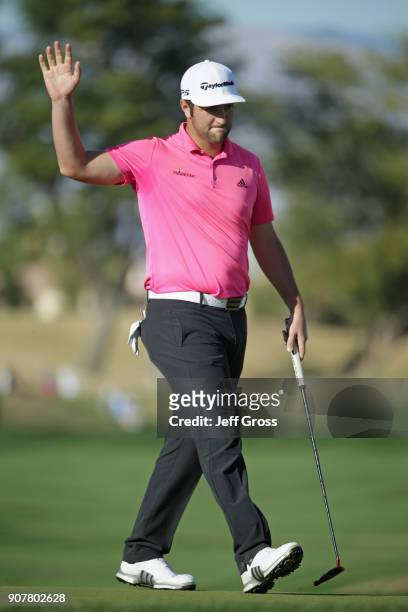 Jon Rahm reacts to his birdie putt on the 16th hole during the third round of the CareerBuilder Challenge at the TPC Stadium Course at PGA West on...