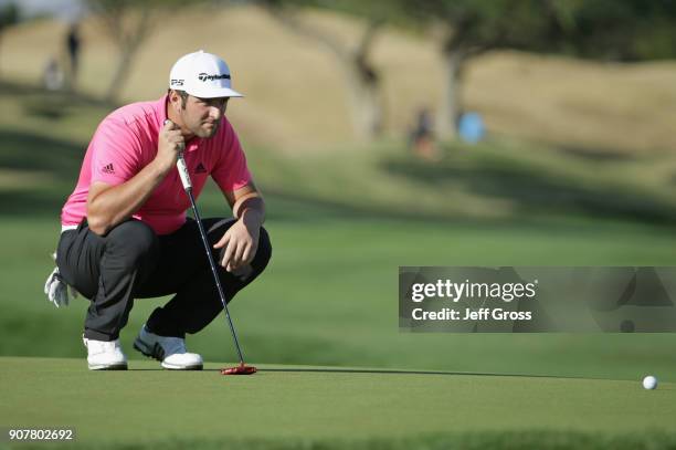 Jon Rahm lines up a putt on the 16th hole during the third round of the CareerBuilder Challenge at the TPC Stadium Course at PGA West on January 20,...