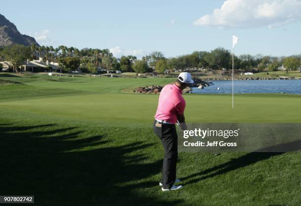 Jon Rahm chips onto the 18th green during the third round of the CareerBuilder Challenge at the TPC Stadium Course at PGA West on January 20, 2018 in...