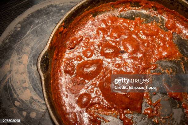 burnt gravy and a messy stove top. - burnt pot stock pictures, royalty-free photos & images