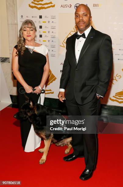 Carol Borden, honoree, Founder & CEO, Guardian Angels Medical Service Dogs Inc, and Huey, arrive at the 3rd Annual Vetty Awards at The Mayflower...