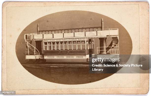 Photographic carte-de-visite featuring a model of a 'patent tramway engine� invented by D Spill and J R Maples.