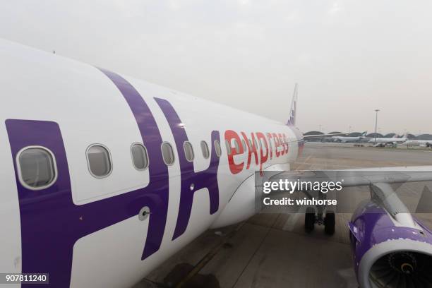 low-cost airline : hk express - 2015 a320 stock pictures, royalty-free photos & images