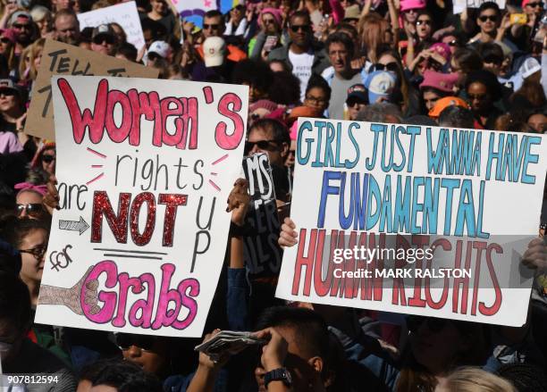 Protesters, part of a 500,000 strong crowd, attend the Women's Rally on the one-year anniversary of the first Women's March in Los Angeles,...