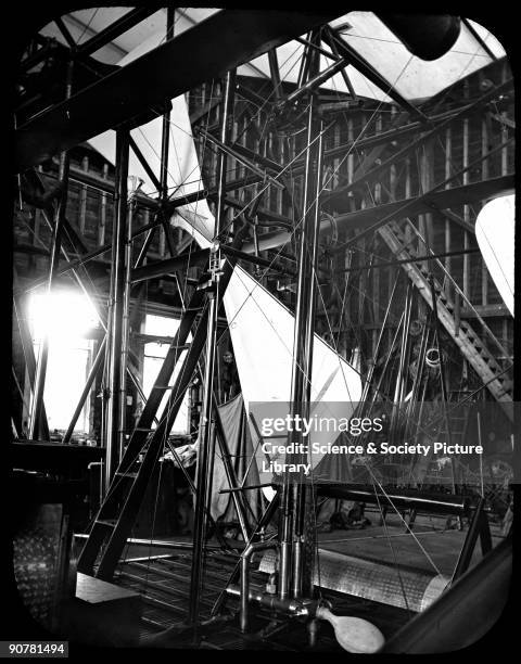 Photograph taken during the assembly of the aircraft. Sir Hiram Stevens Maxim designed and built this flying machine in 1893-1894. He had previously...