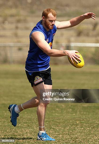 Adam Cooney of the Bulldogs kicks during a Western Bulldogs AFL training session at Whitten Oval on September 15, 2009 in Melbourne, Australia.