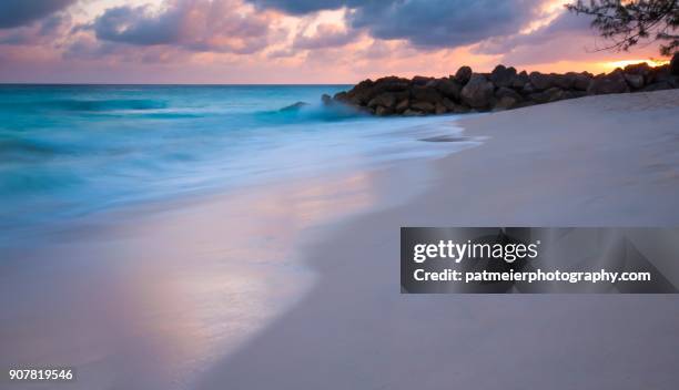 stunning sunset on dover beach in barbados - bridgetown barbados stock pictures, royalty-free photos & images