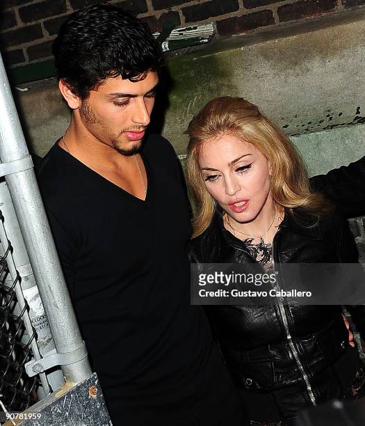 Model Jesus Luz and Madonna attend Marc Jacobs Spring 2010 at The Armory on September 14, 2009 in New York City.