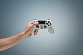 Male Hands Holding Gamepad