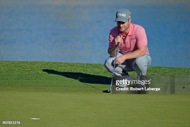David Lingmerth of Sweden lines up a putt on the 18th green during the third round of the CareerBuilder Challenge at the Jack Nicklaus Tournament...